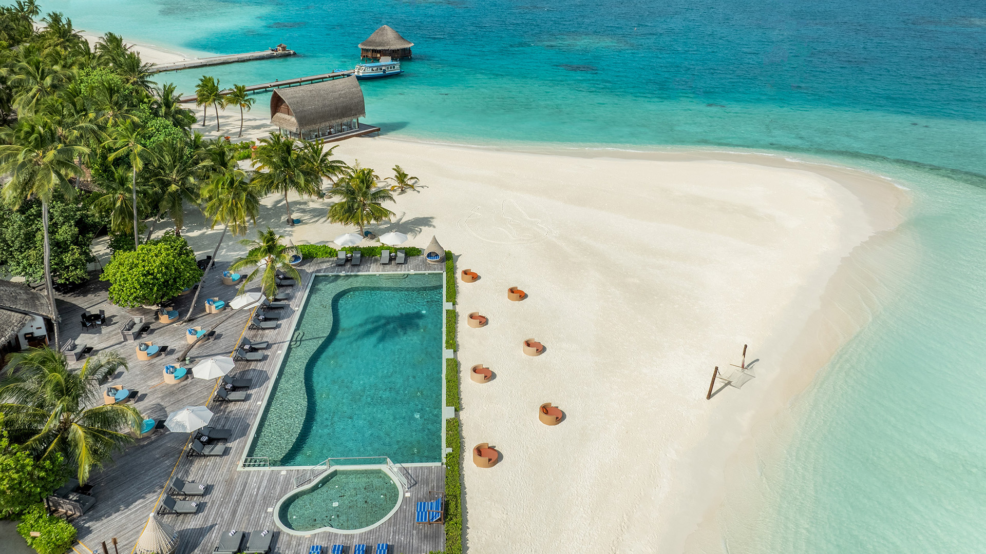 an-velavaru_ Kuredhi Pool Bar Beach Pavilion_Aerial_7-hero